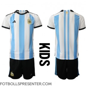 Argentina Hemmatröja Barn VM 2022 Kortärmad (+ korta byxor)